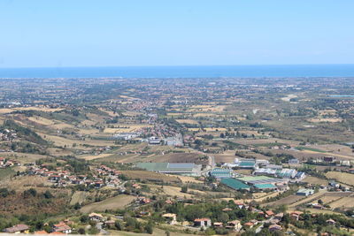 Aerial view of cityscape against clear sky