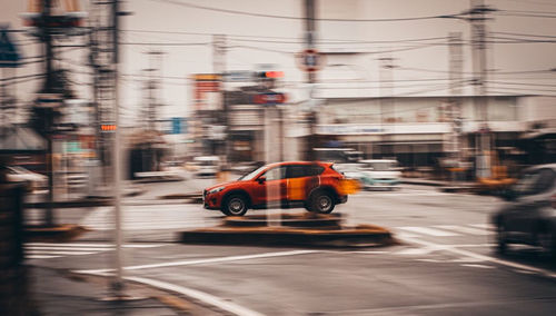 Blurred motion of car on city street