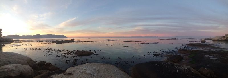 Scenic view of sea against sky at sunset