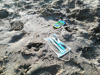 High angle view of toy on beach