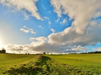 Scenic view of land against sky