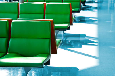 Close-up of empty chairs and table