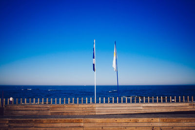 View of flags at seashore