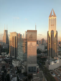 Buildings in city against sky