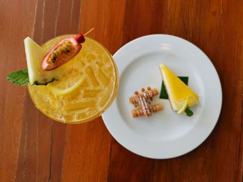 High angle view of fruits in plate on table