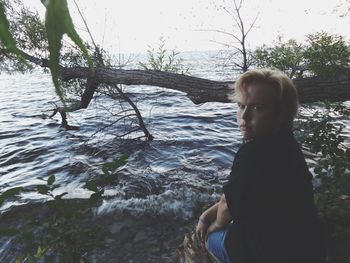 Woman relaxing in lake