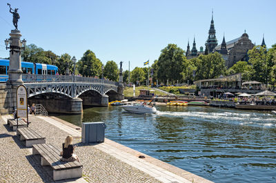 Bridge over river against clear sky