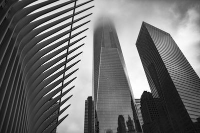 Low angle view of modern buildings against sky