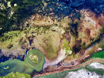 High angle view of rocks in sea