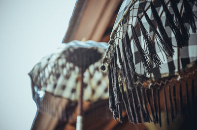 Close-up of clothes hanging on rope