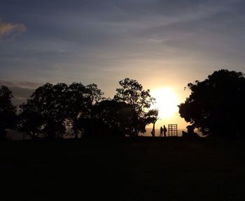 Silhouette of trees at sunset