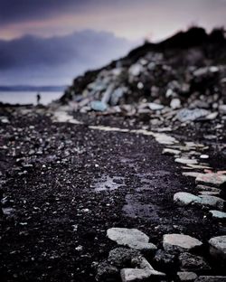 Surface level of beach against sky