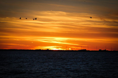 Scenic view of dramatic sky during sunset