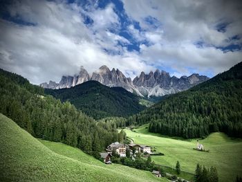 View of landscape and mountains against sky