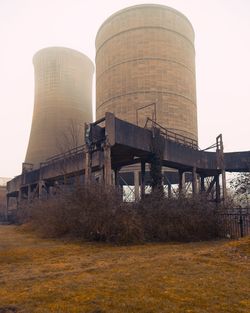 Low angle view of water tower against sky