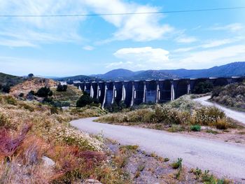 Scenic view of dam against sky