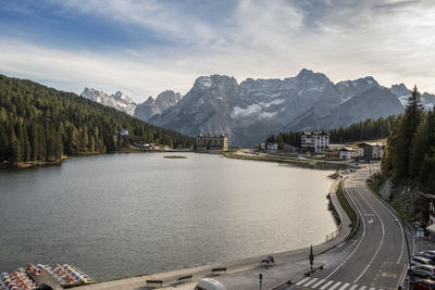 Panoramic shot of road by mountains against sky