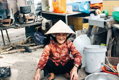 Portrait of smiling woman wearing hat