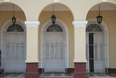 Exterior of building with three arches