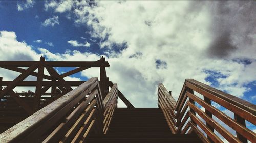 Low angle view of built structure against cloudy sky