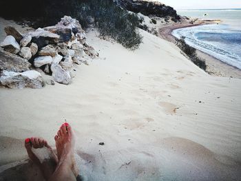 Low section of woman on beach