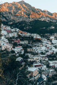 High angle view of townscape and mountains