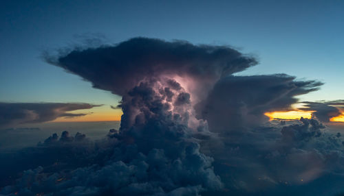 Scenic view of dramatic sky during sunset