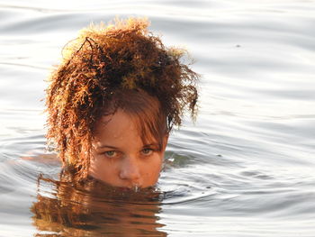 High angle portrait of girl in sea