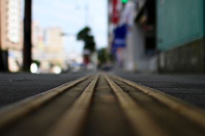 Surface level of wood against blurred background