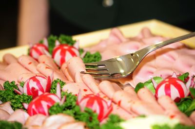 A platter of cold meats as snacks in food catering