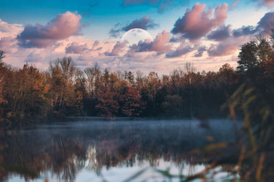 Scenic view of lake against sky during autumn