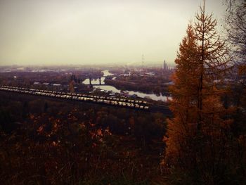 High angle view of railroad tracks against sky during autumn