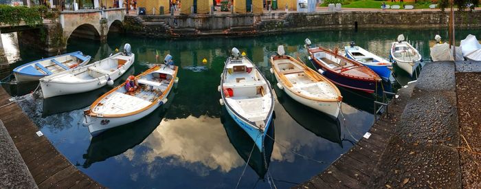 High angle view of boats moored in canal