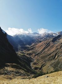 Aerial view of valley and mountains against sky