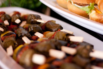 Stuffed grape leaves on a skewer