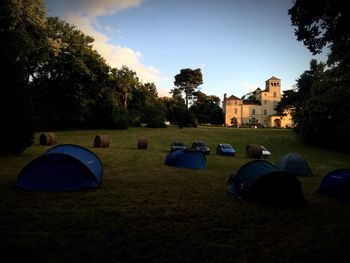 View of tent on landscape against the sky