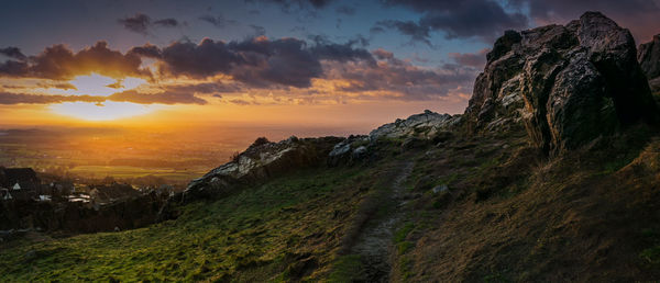 Scenic view of mountains against sky during sunset