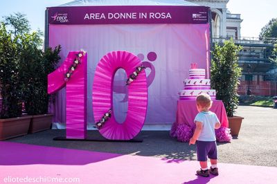 Full length of boy standing on footpath