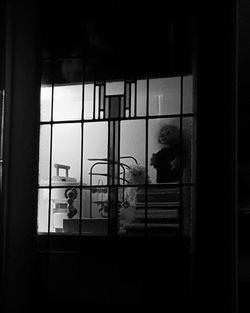 People seen through window