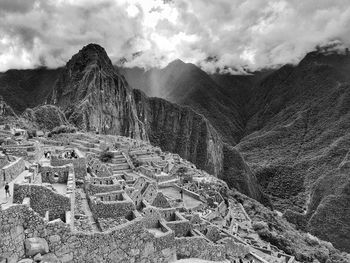 High angle view of machu picchu against cloudy sky