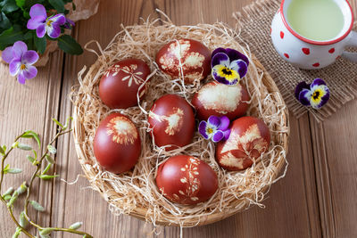 High angle view of eggs in basket on table