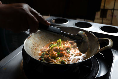 Close-up of person preparing food