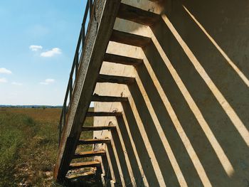 Metallic structure against sky