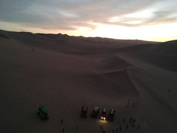 High angle view of desert against sky during sunset