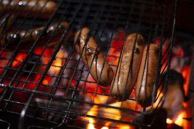 Close-up of meat on barbecue grill