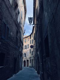Narrow alley along buildings