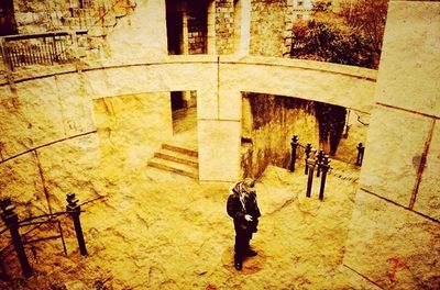 Full length of woman standing in building
