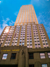 Low angle view of building against blue sky