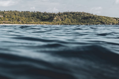 Surface level of sea against sky