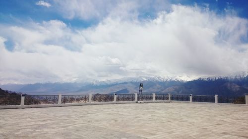Empty observation point against mountain range
